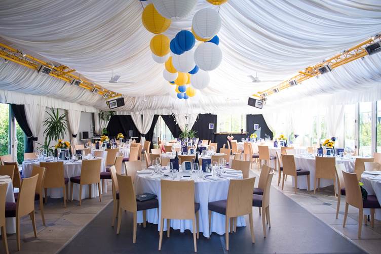 Blue yellow and white marquee lanterns