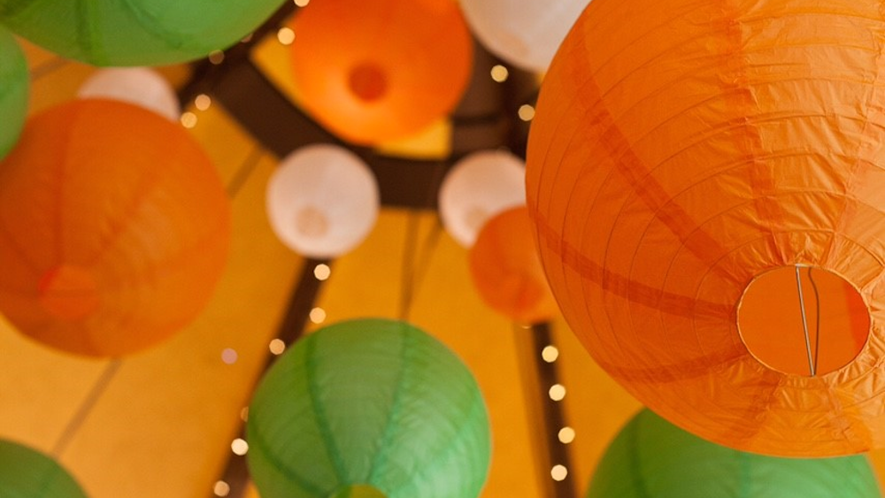 Brightly coloured lanterns decorate tipi Brightly coloured lanterns decorate tipi