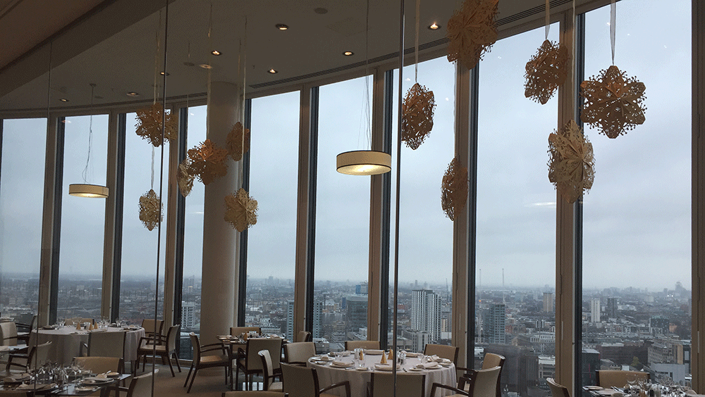 Laser Cut Gold 3D Snowflakes decorate private London restaurant