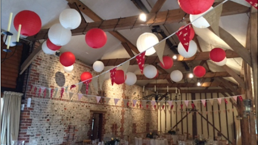Why we Love Barn Weddings Decorated with Paper Lanterns