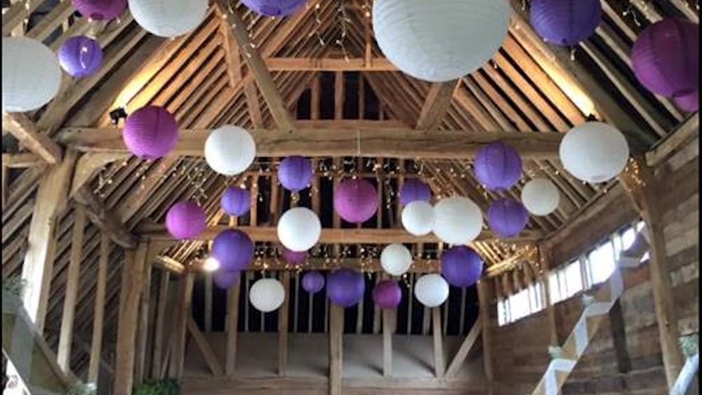 Why we Love Barn Weddings Decorated with Paper Lanterns