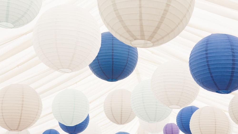 Blue and dove grey lanterns in a Chill Out Marquee