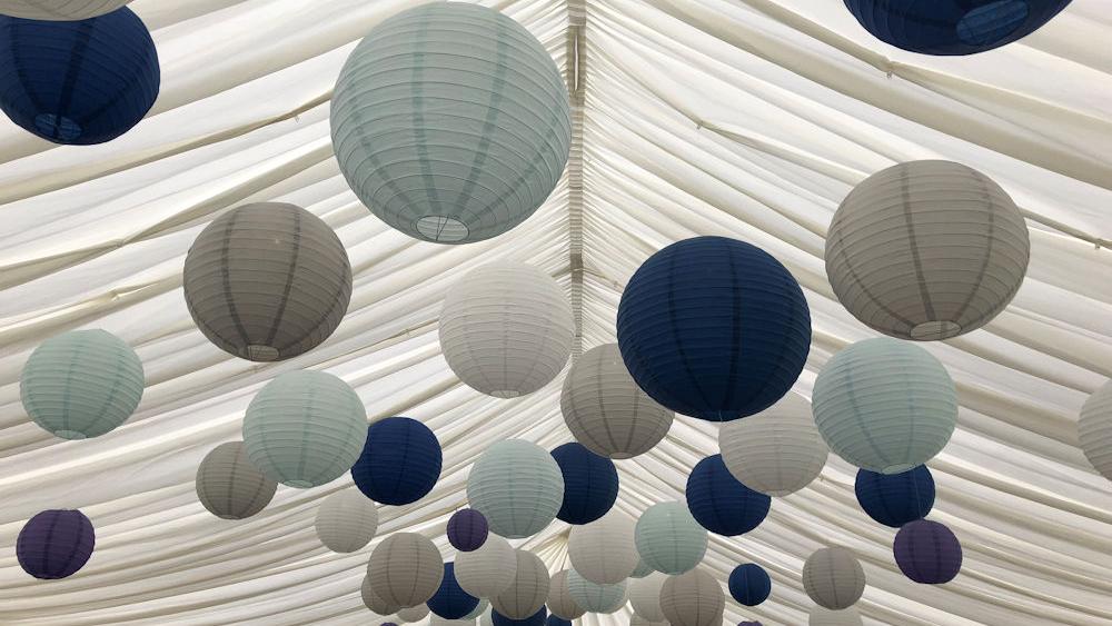 Blue and dove grey lanterns in a Chill Out Marquee