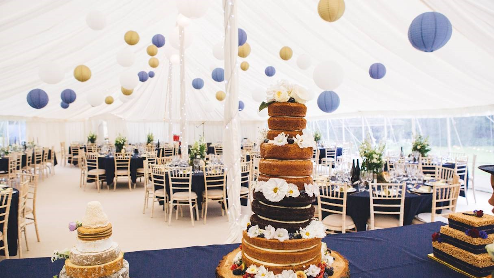 Gold and Blue Lanterns Stun in the White Marquee
