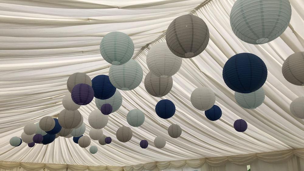 Blue and dove grey lanterns in a Chill Out Marquee