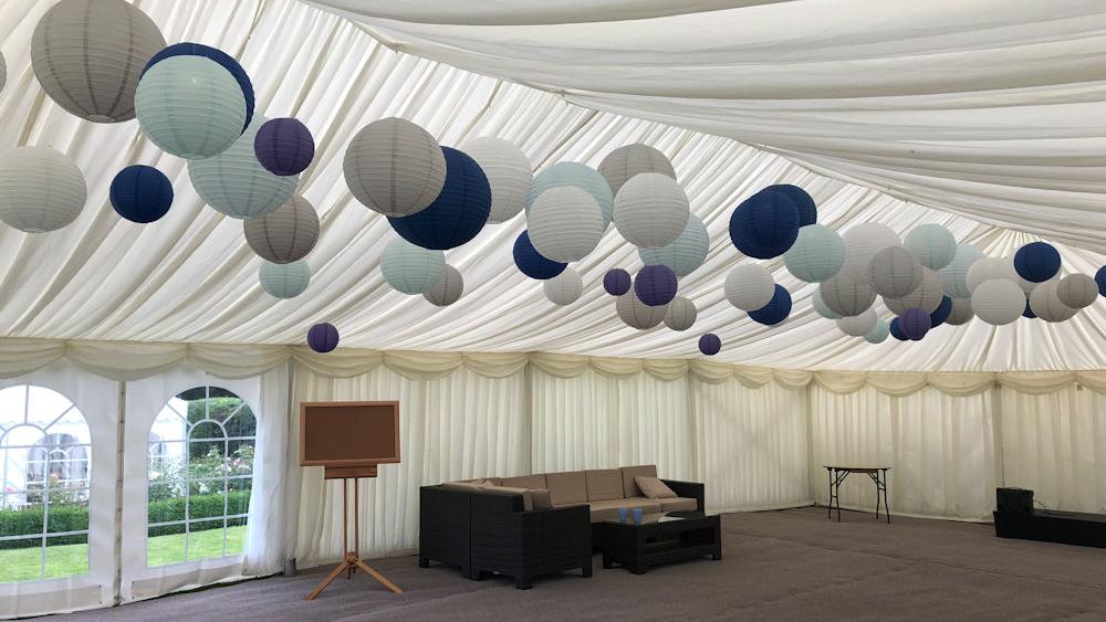 Blue and dove grey lanterns in a Chill Out Marquee