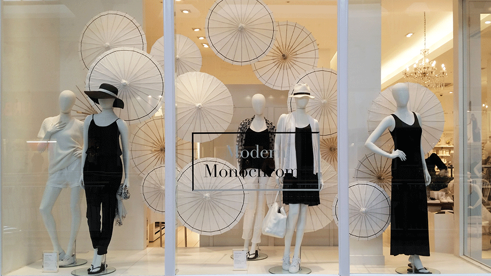 The White Company dress their windows with Paper Parasols