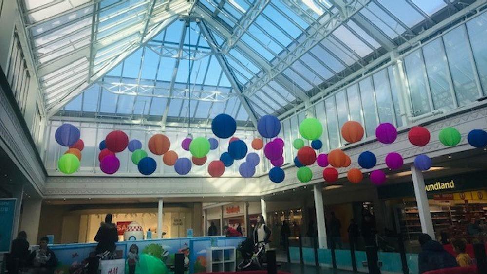 Coloured Lanterns decorate The Square Shopping Centre in Camberley
