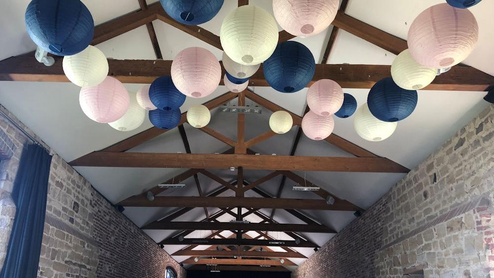 Navy paper lanterns look stunning at Hendall Manor Barns