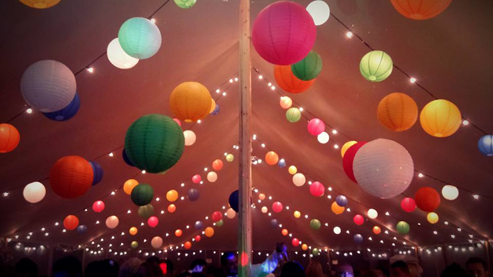 Coloured Lanterns decorate huge Sperry Tent at Angrove Park