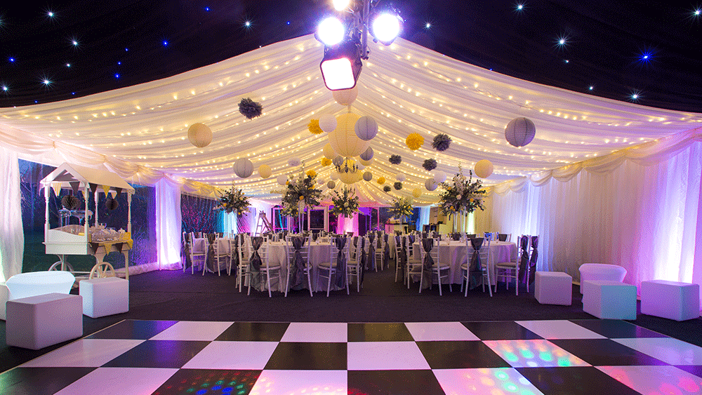 Tissue Pom Poms and Paper Lanterns are a Beautiful Combination