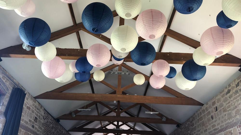 Navy paper lanterns look stunning at Hendall Manor Barns