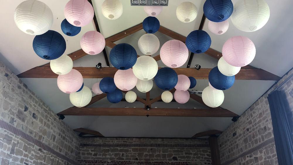 Navy paper lanterns look stunning at Hendall Manor Barns