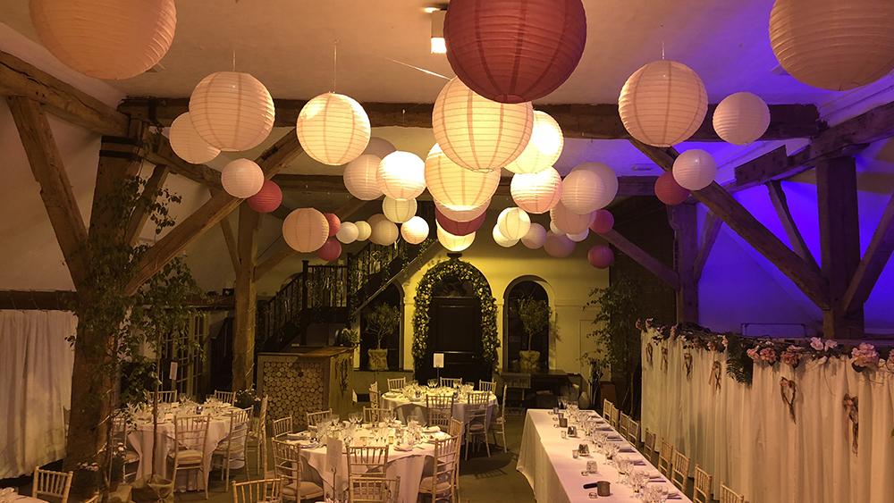 Pink Paper Lanterns in the barn at Dorset House School, Pulborough