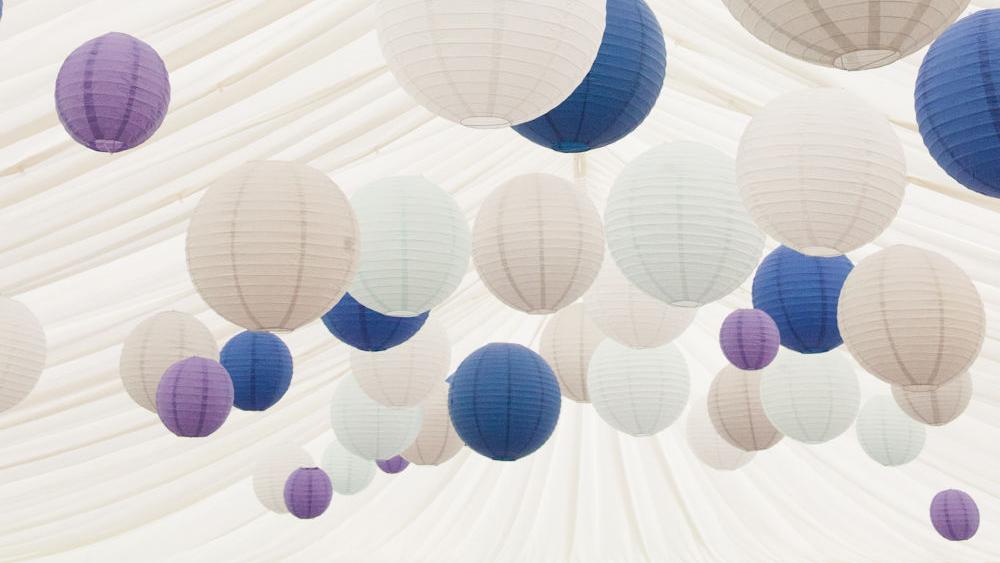 Blue and dove grey lanterns in a Chill Out Marquee