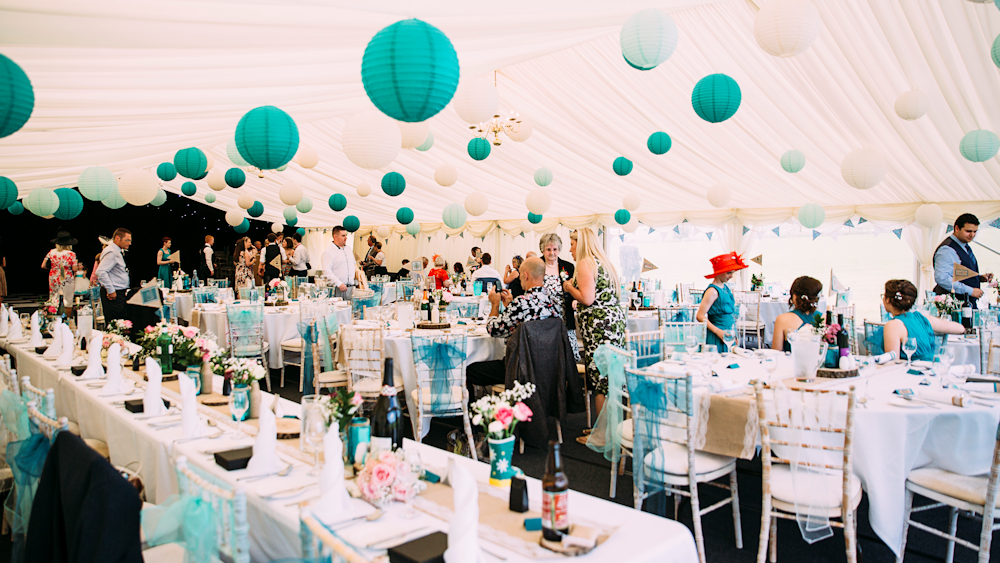 Teal Wedding Lanterns decorate a Waltons Marquee