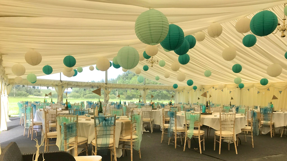 Teal Wedding Lanterns decorate a Waltons Marquee