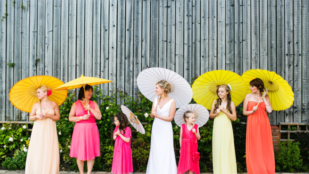 Orange shop parasols wedding