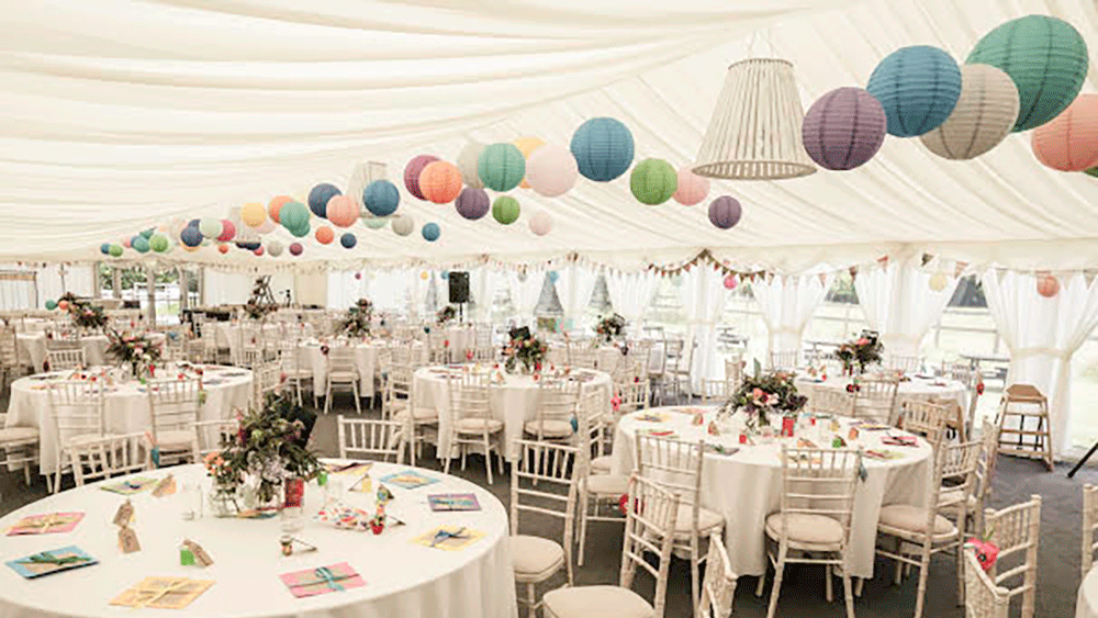 Welsh Wedding Marquee Decorated with Multi Coloured Paper Lanterns