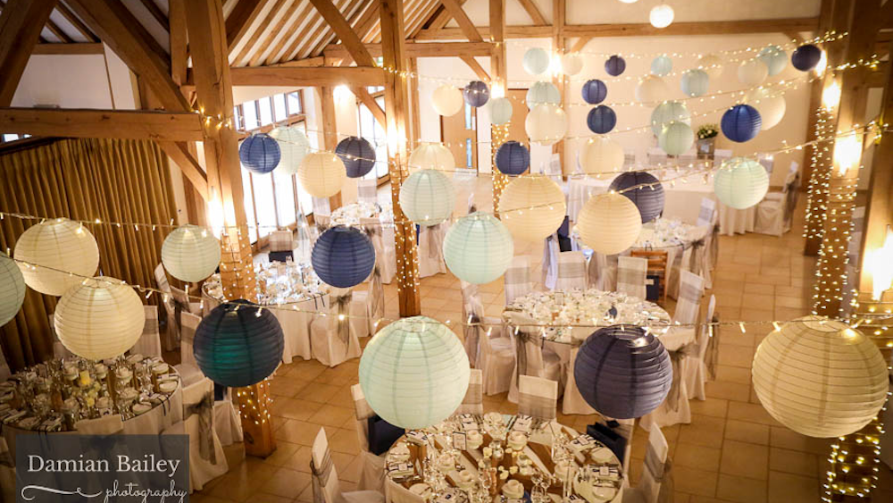 Rich coloured lanterns at Rivervale Barn, Guildford