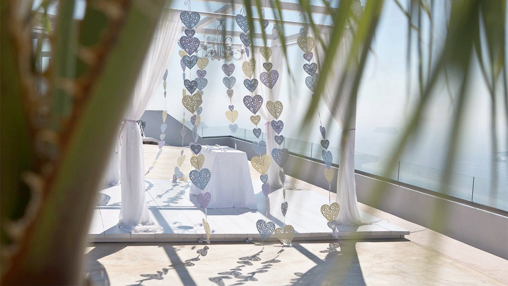 Vertical Heart Bunting Adorns Wedding in Santorini