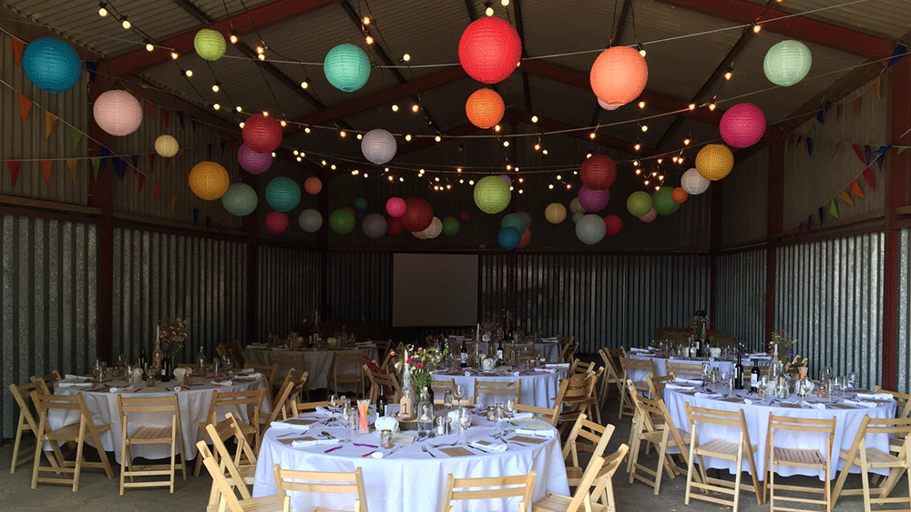 wedding lanterns suspended on festoon lights hanging lantern company