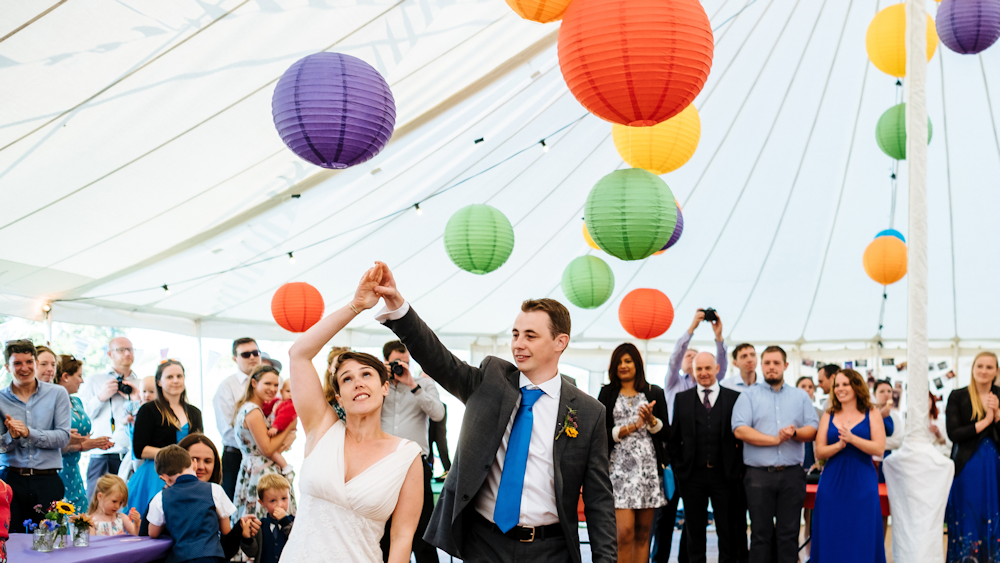 Hanging Lanterns decorate Traditional Marquee