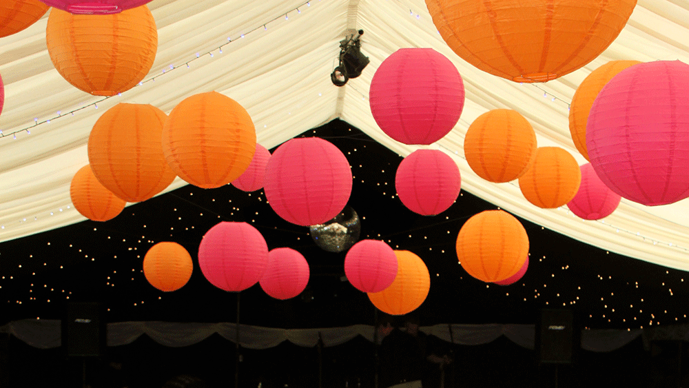 Bring Warmth to your Marquee Wedding with Coloured Paper Lanterns