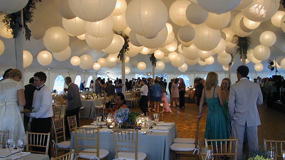 A Sky Of Illuminated Paper Lanterns Hanging Lantern Company