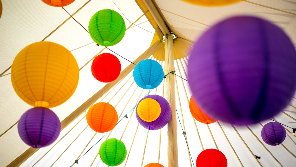 Hanging Lanterns decorate Traditional Marquee