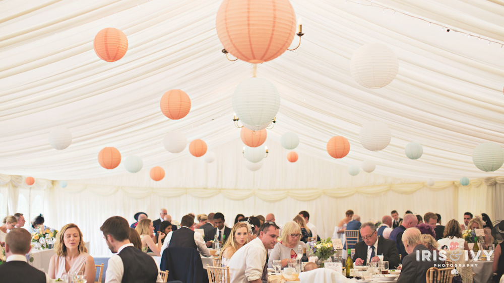 Peach and baby blue hanging lanterns at Wethele Manor
