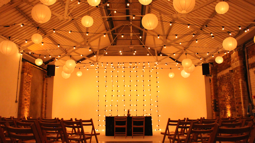 Ivory Lanterns and Festoon Lights drape Shoreditch Studios