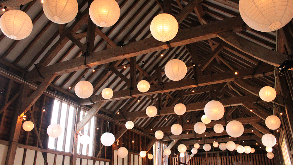 Ivory lanterns provide a rustic, classic look at weddings