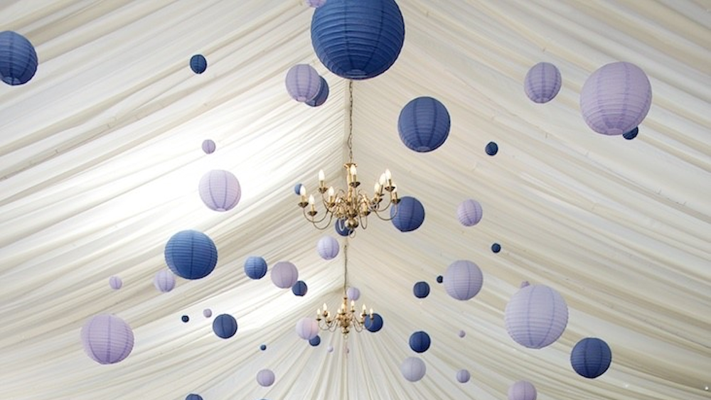 Purple lanterns decorate The Granary at Fawsley