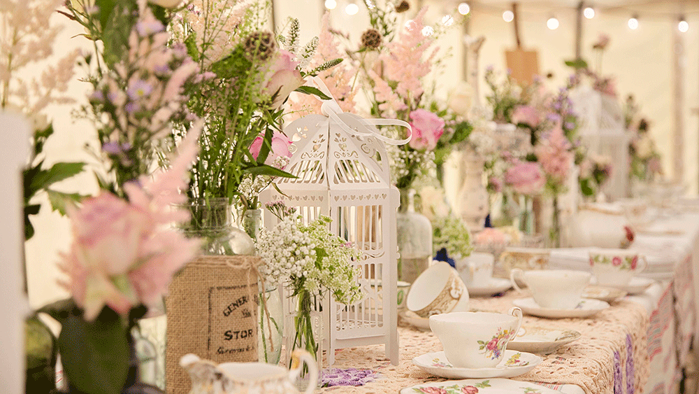 Create an English Country Garden Wedding with birdcage lanterns and vintage crockery