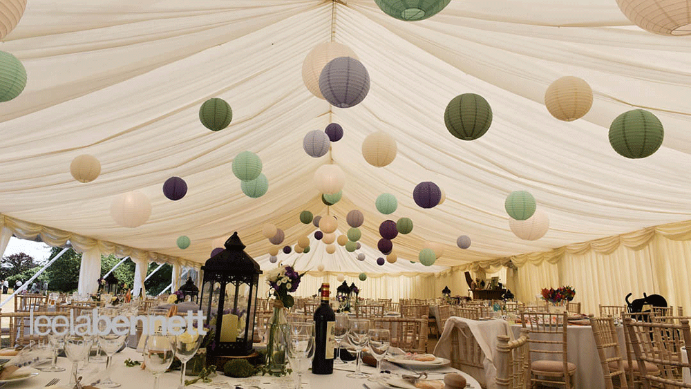 Wedding Lanterns Decorate a Secret Garden Style Marquee