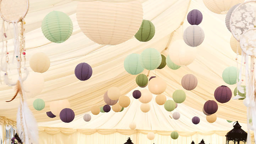 Wedding Lanterns Decorate a Secret Garden Style Marquee