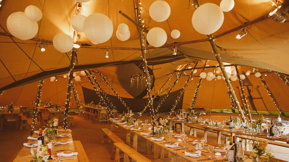 White Lanterns Decorate Giant Tipi Tents at Camp Katur