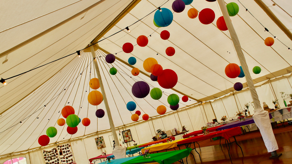 Hanging Lanterns decorate Traditional Marquee