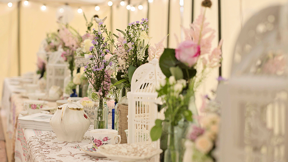 Create an English Country Garden Wedding with birdcage lanterns and vintage crockery