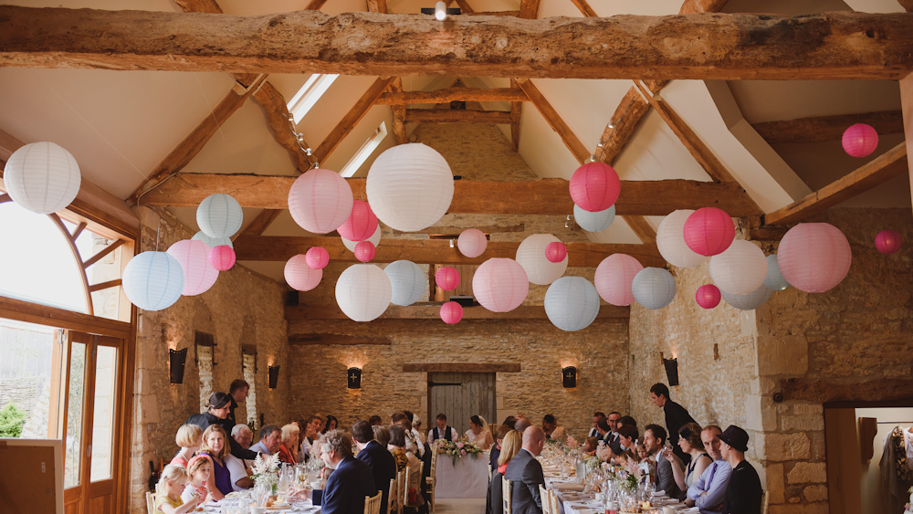 Pink and blue paper lanterns create a fabulous feature in Oxleaze Barn