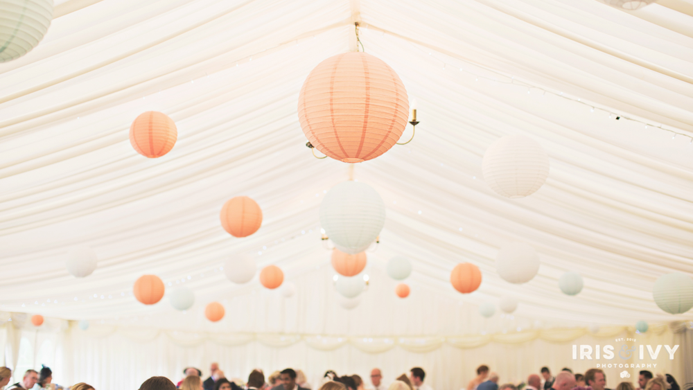 Peach and baby blue hanging lanterns at Wethele Manor