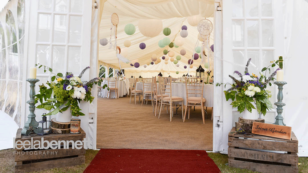 Wedding Lanterns Decorate a Secret Garden Style Marquee