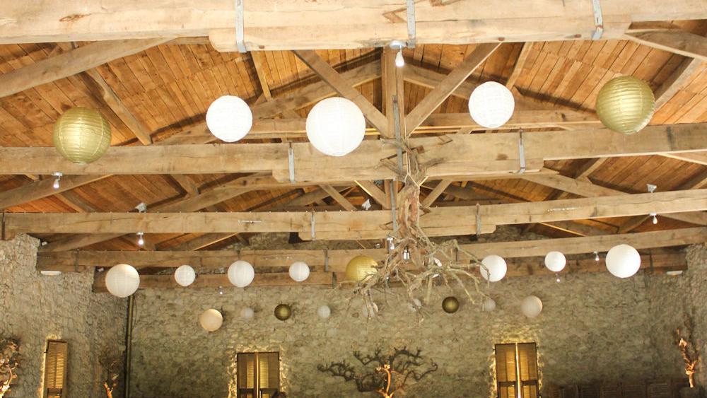 white and gold paper lanterns