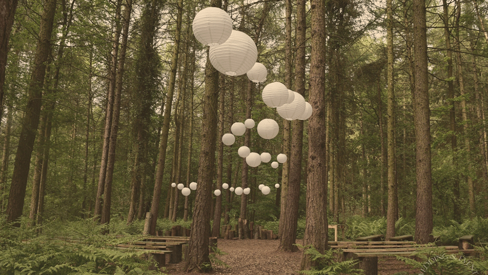 White Wedding Lanterns for a Rustic Wooded Ceremony