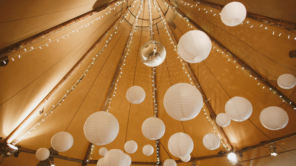 White Lanterns Decorate Giant Tipi Tents at Camp Katur