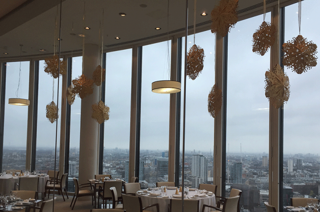 Laser Cut Gold 3D Snowflakes decorate private London restaurant