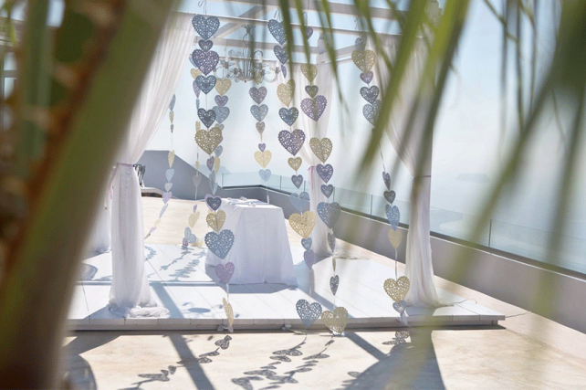 Vertical Heart Bunting Adorns Wedding in Santorini