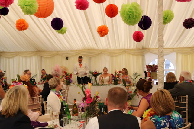 Coloured wedding lanterns and tissue pompoms