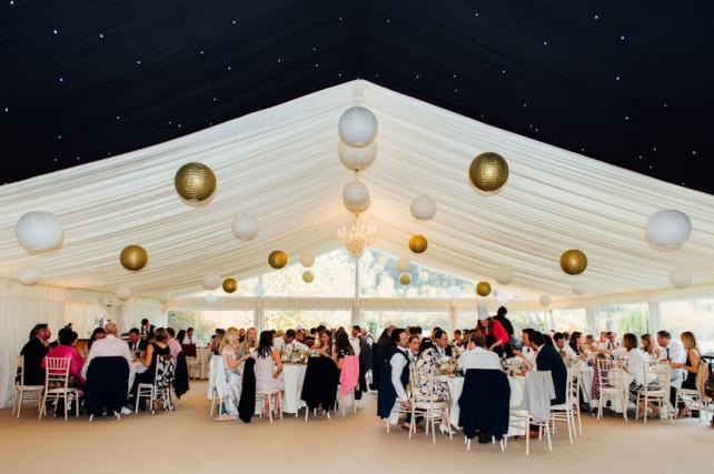 Simple gold and white wedding lantern canopy